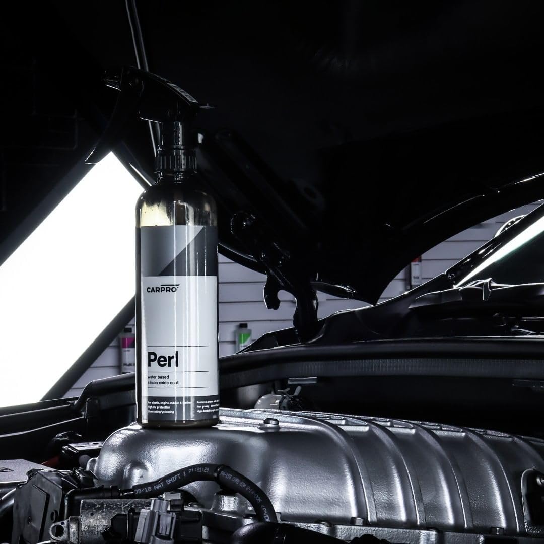 CARPRO in engine bay on plastic components showing clean protective sheen