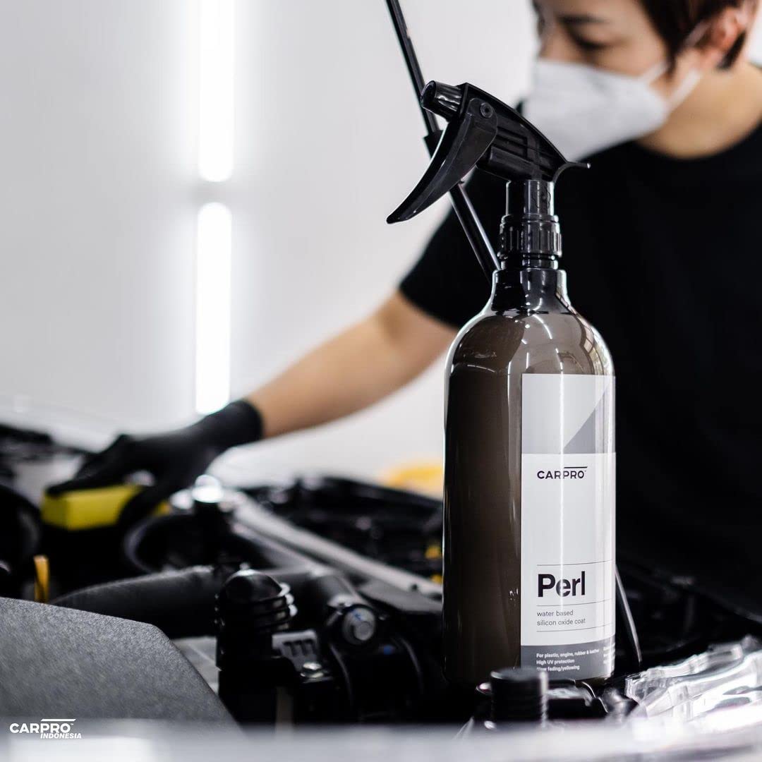 CARPRO PERL applied to tire sidewall showing improved appearance and protection