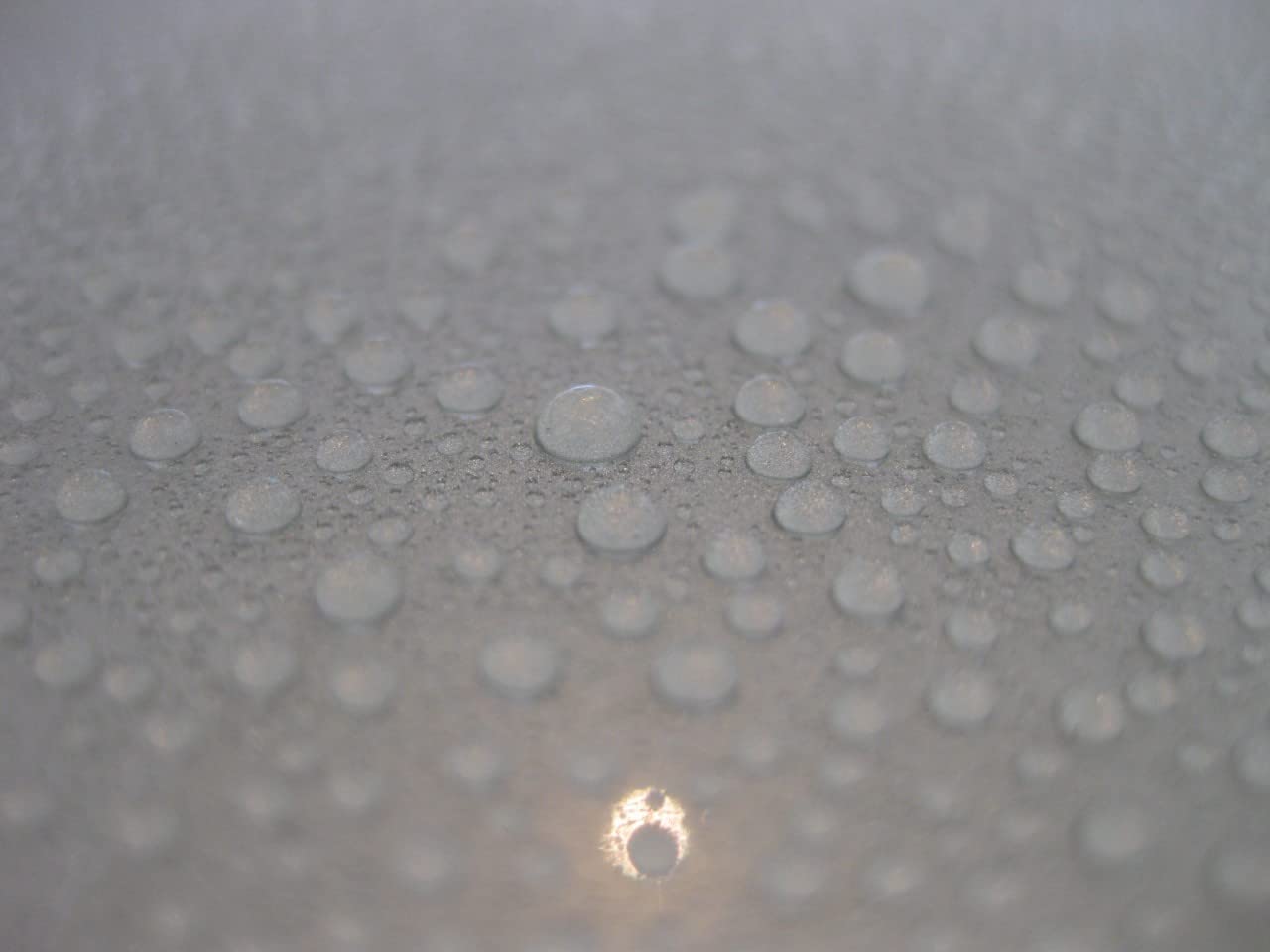 CARPRO close-up of Reload 2.0 droplet highlighting silica texture and clarity