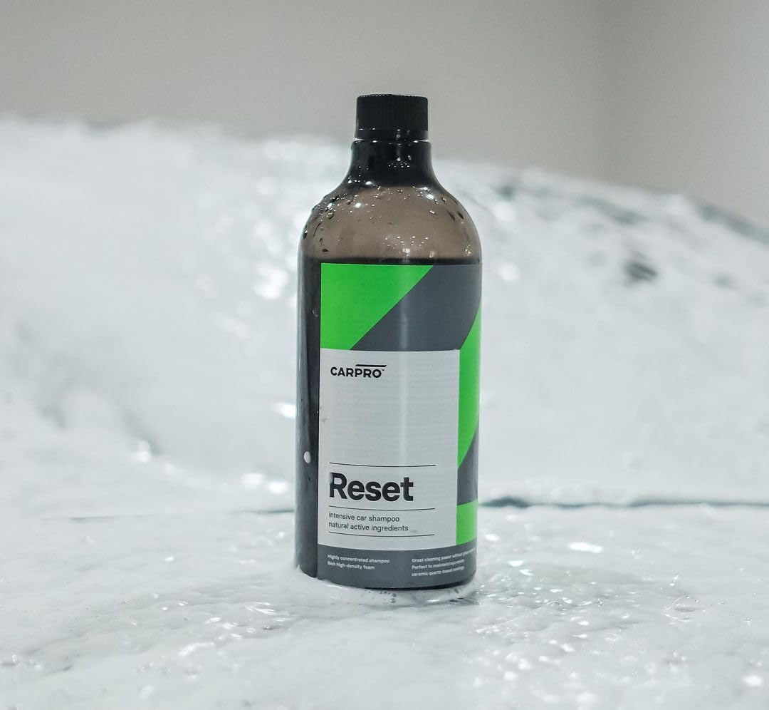 CARPRO Reset bottle displayed with coatings to show compatibility benefit