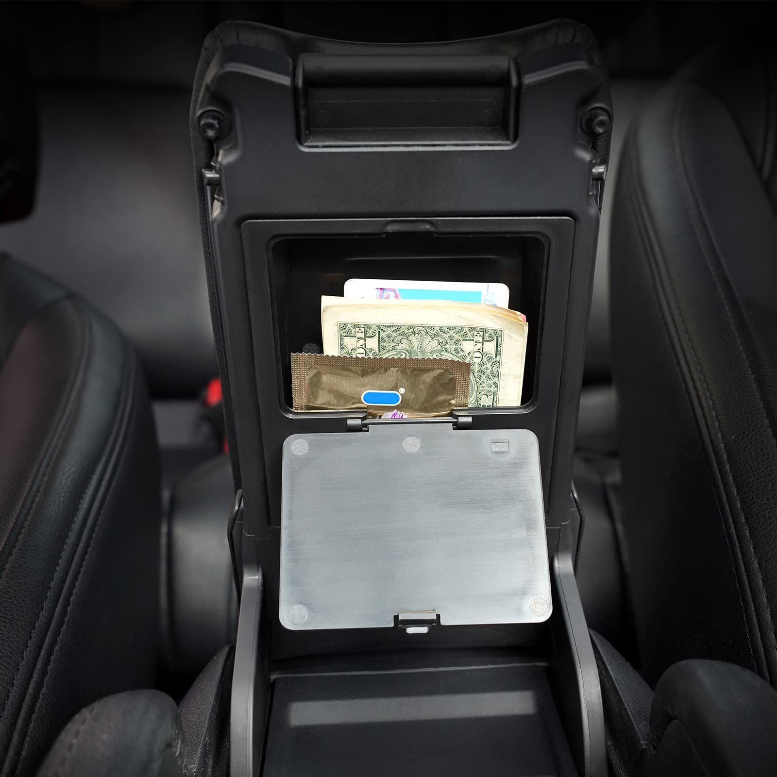 CarQiWireless organizer next to smartphone to show compact scale and space-saving design