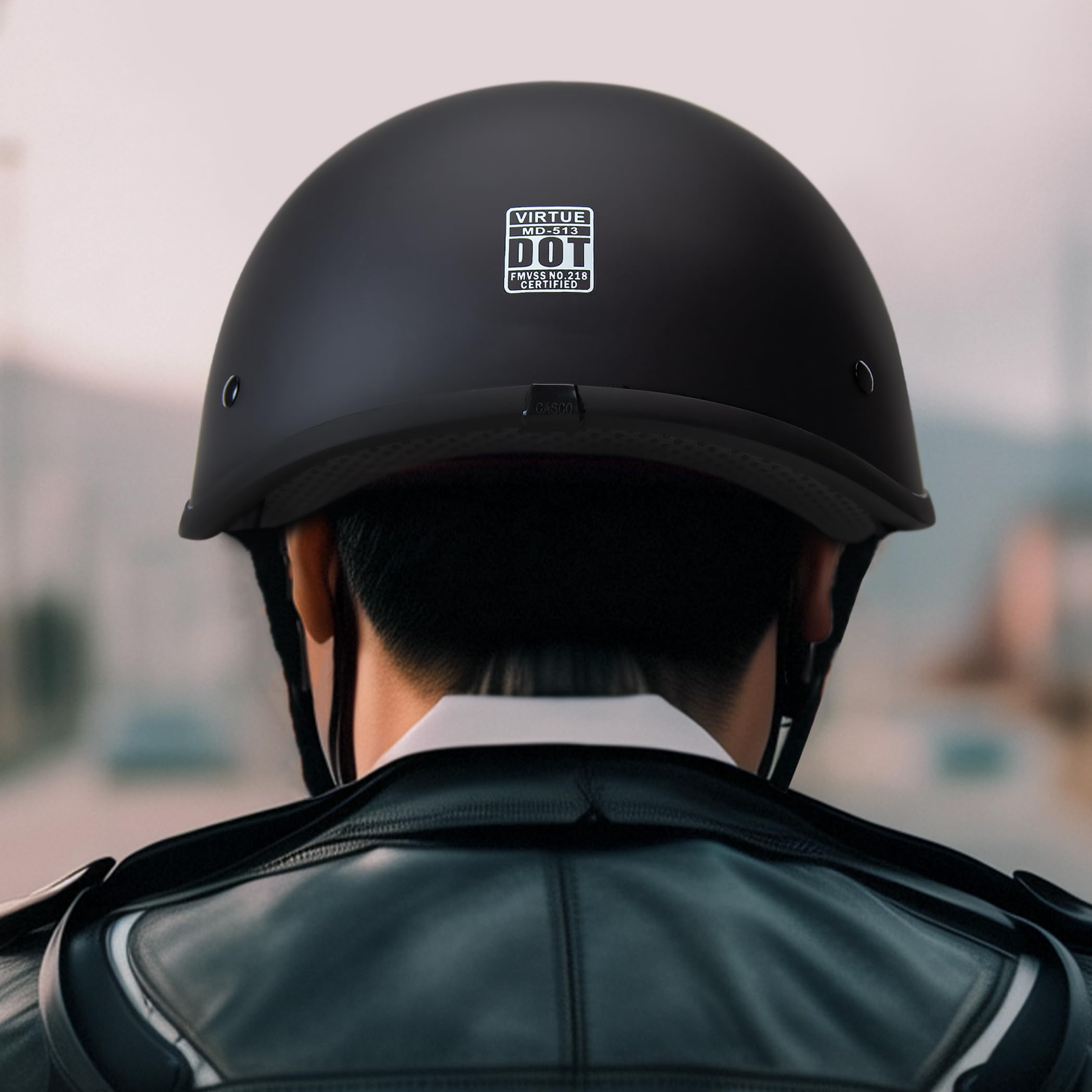 CARTMAN wearer on scooter in city setting showing practical commuter protection