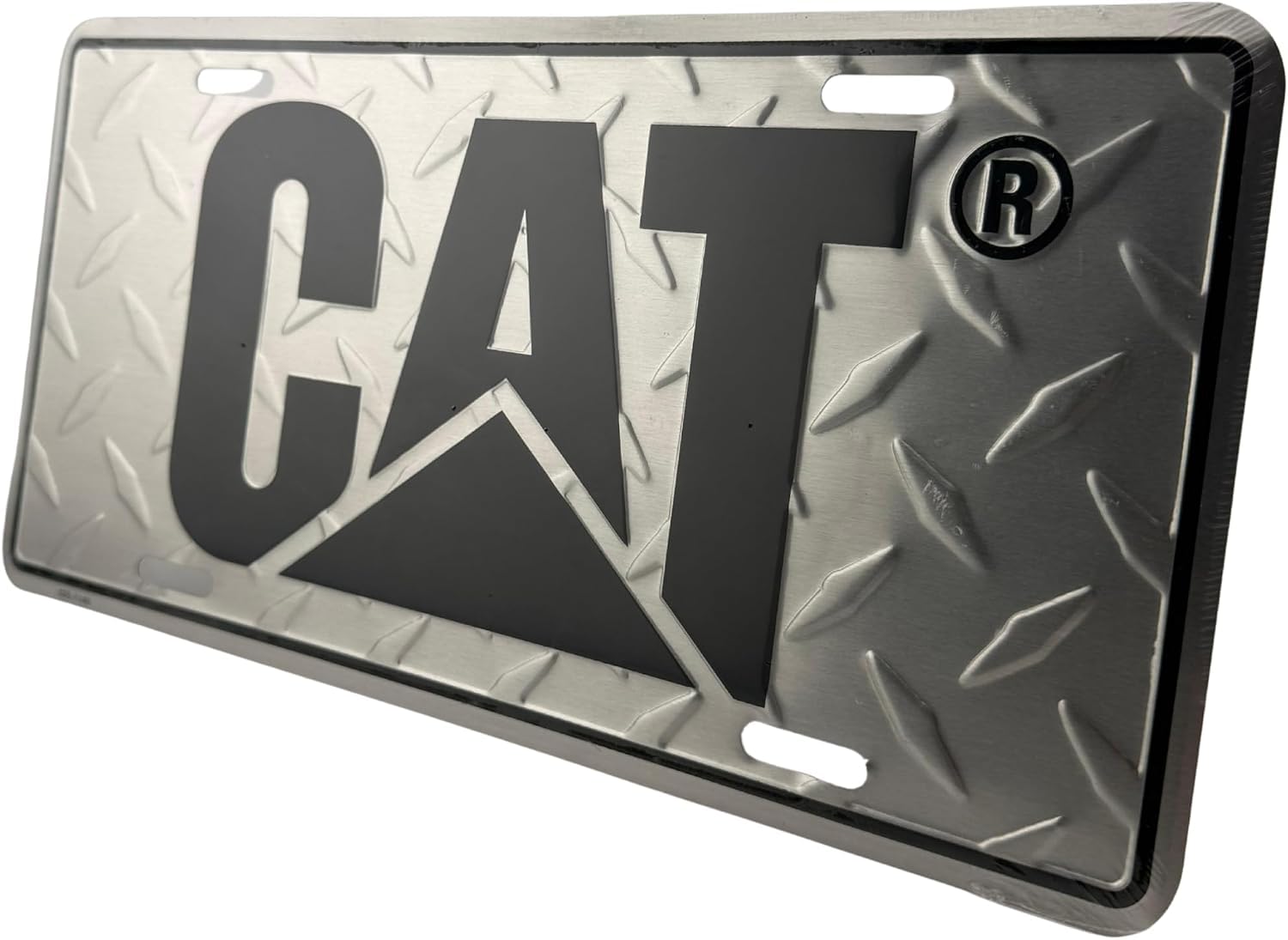 Generic CAT plate displayed in a garage on wall for industrial décor appeal