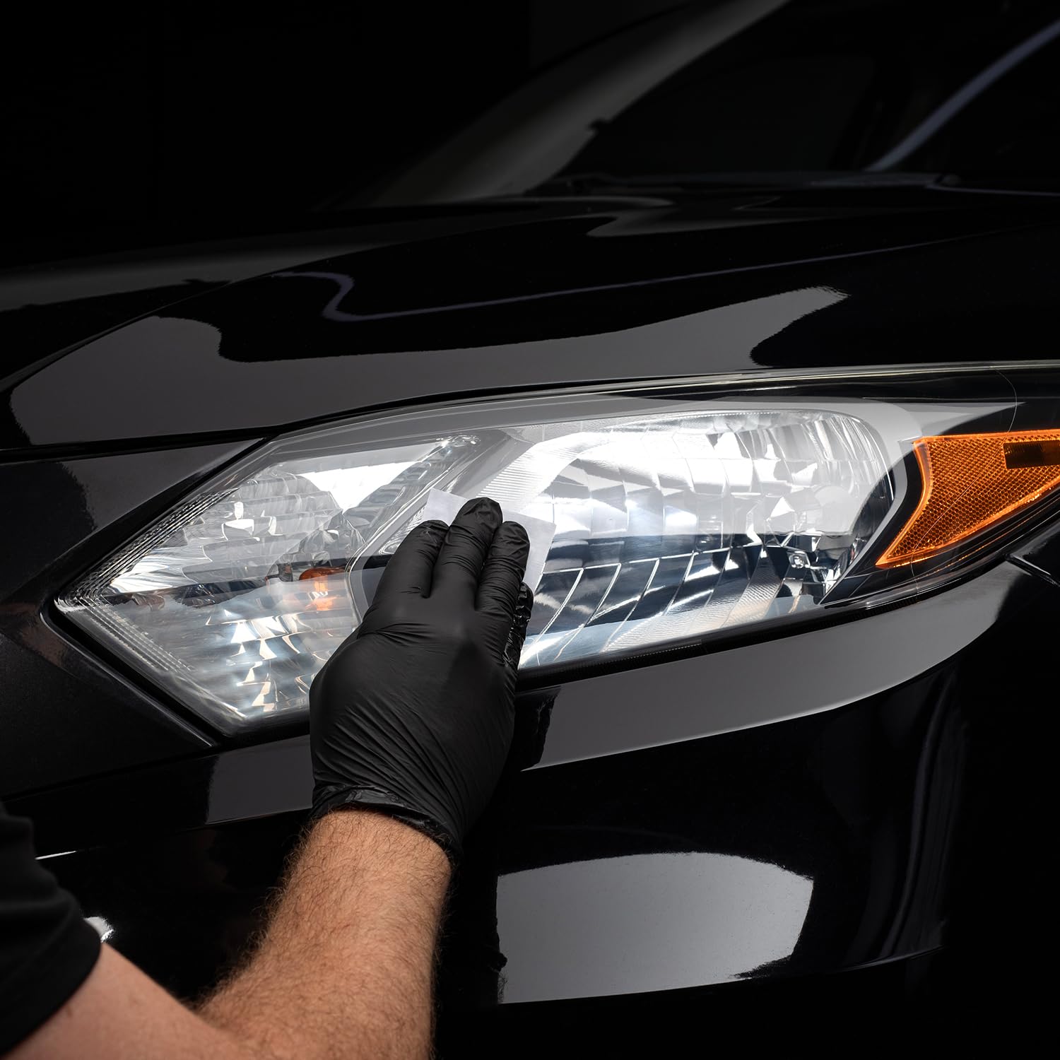 CERAKOTE headlight kit shown in hand to indicate compact size