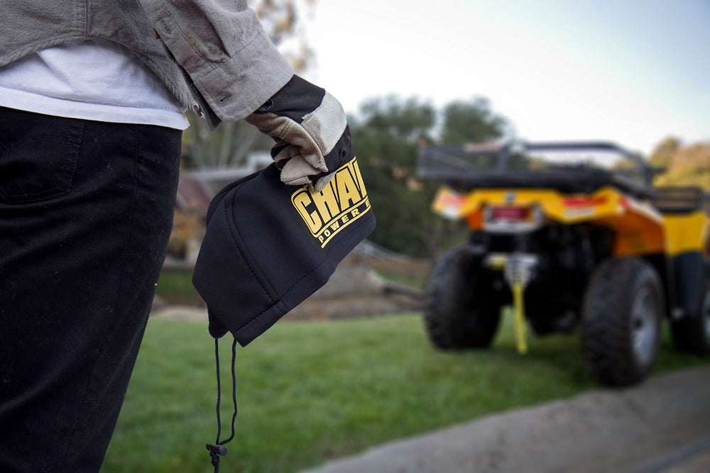 Champion Power Equipment cover installed on truck winch demonstrating protection