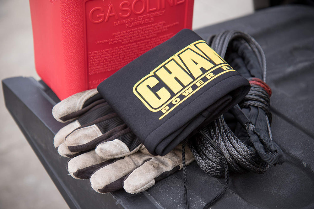 Champion Power Equipment packaging with cover next to ruler showing size