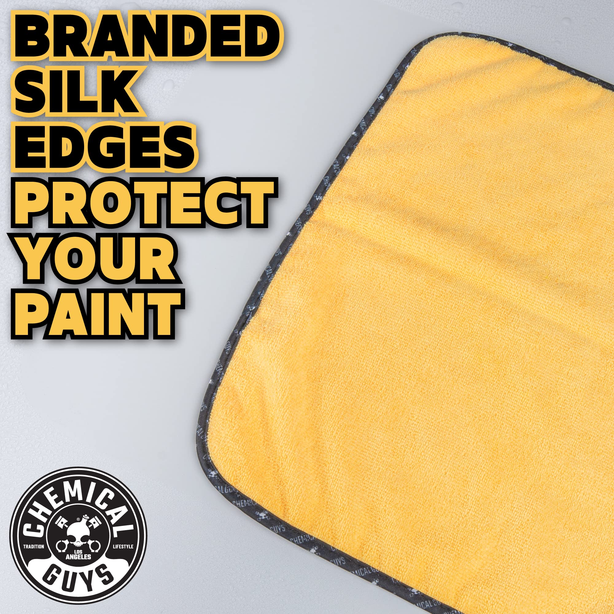 Chemical Guys towel polishing glass to a clear, streak-free shine