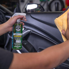 Chemical Guys HydroInterior being sprayed onto a microfiber towel for safe application