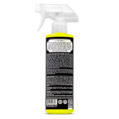 Chemical Guys spray nozzle mid-spray demonstrating controlled mist application advantage
