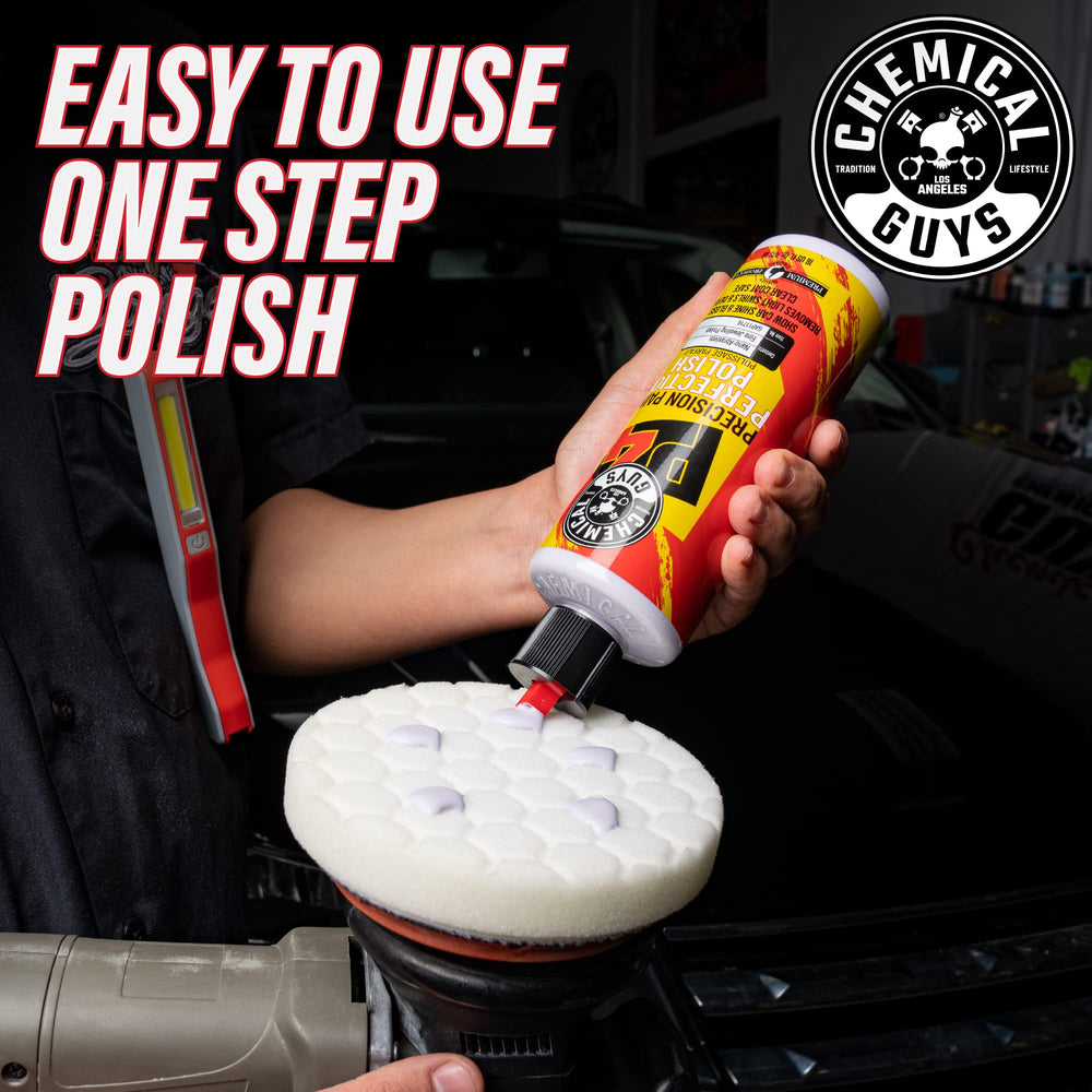 Chemical Guys polish arranged with pads and towels showcasing a complete detailing setup
