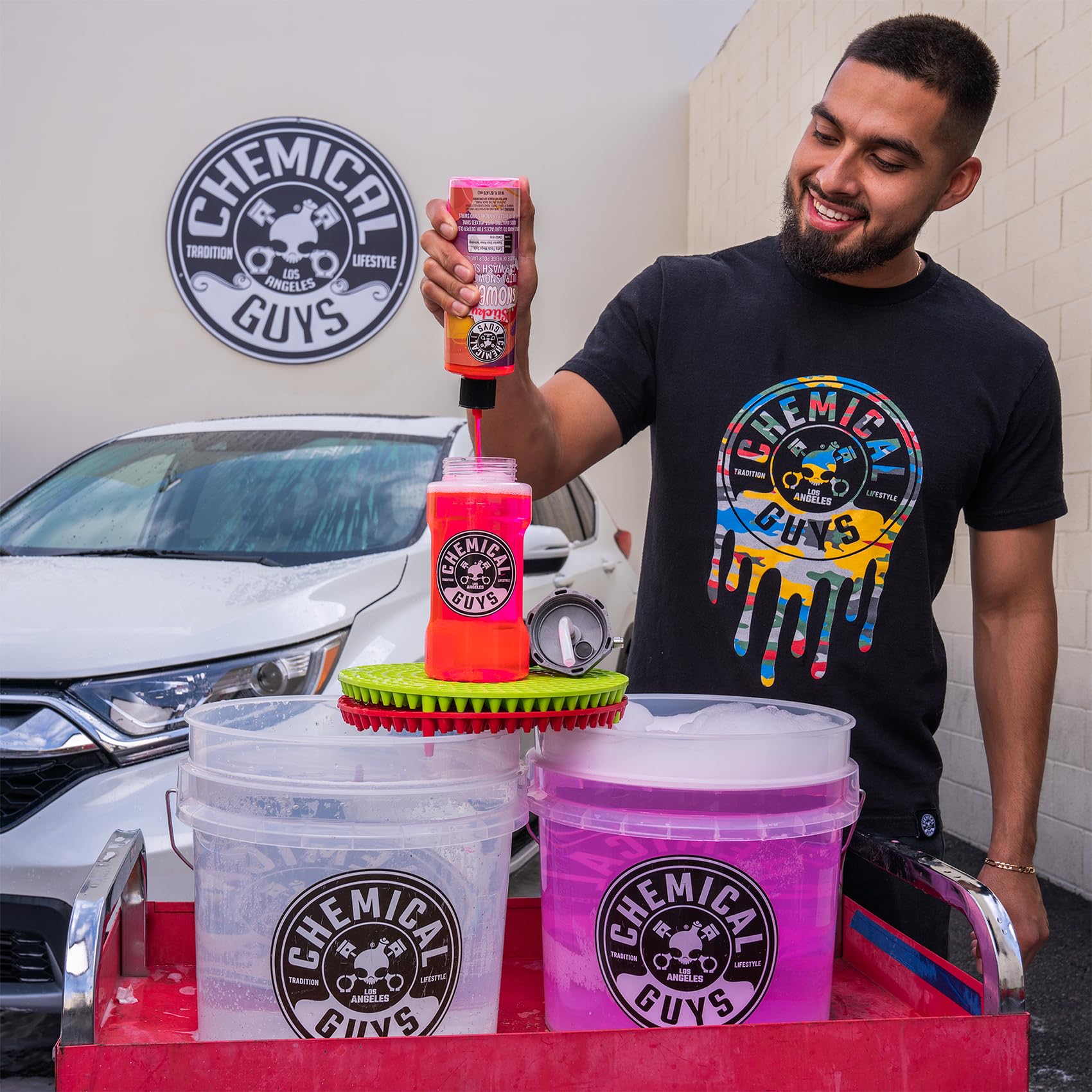 Chemical Guys driveway wash lifestyle scene illustrating easy at-home detailing