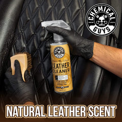 Chemical Guys Total Interior Cleaner pouring from bottle onto cloth demonstrating safe multi-surface cleaning