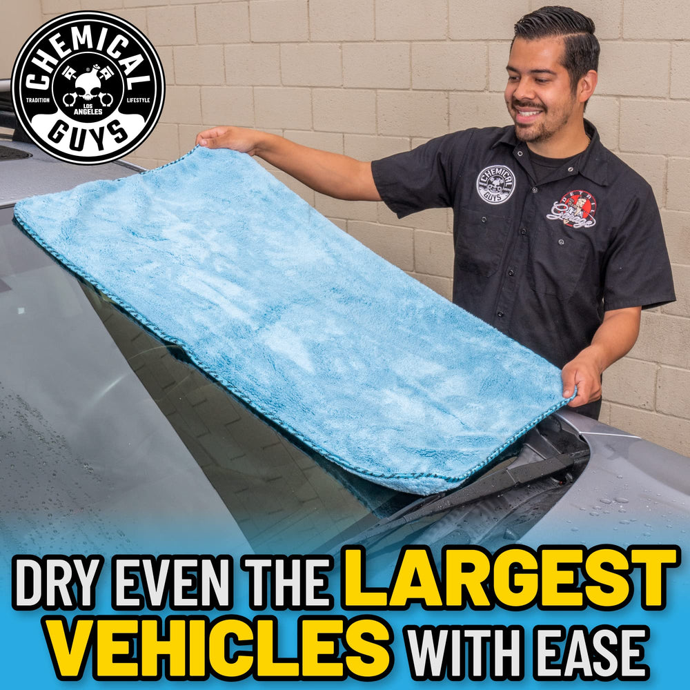 Chemical Guys towel drying a car door panel, showing streak-free finish and safe contact
