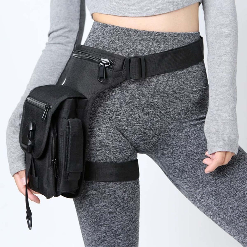 chrisdien deny front view of black thigh bag showing slim profile and pockets, great for quick access