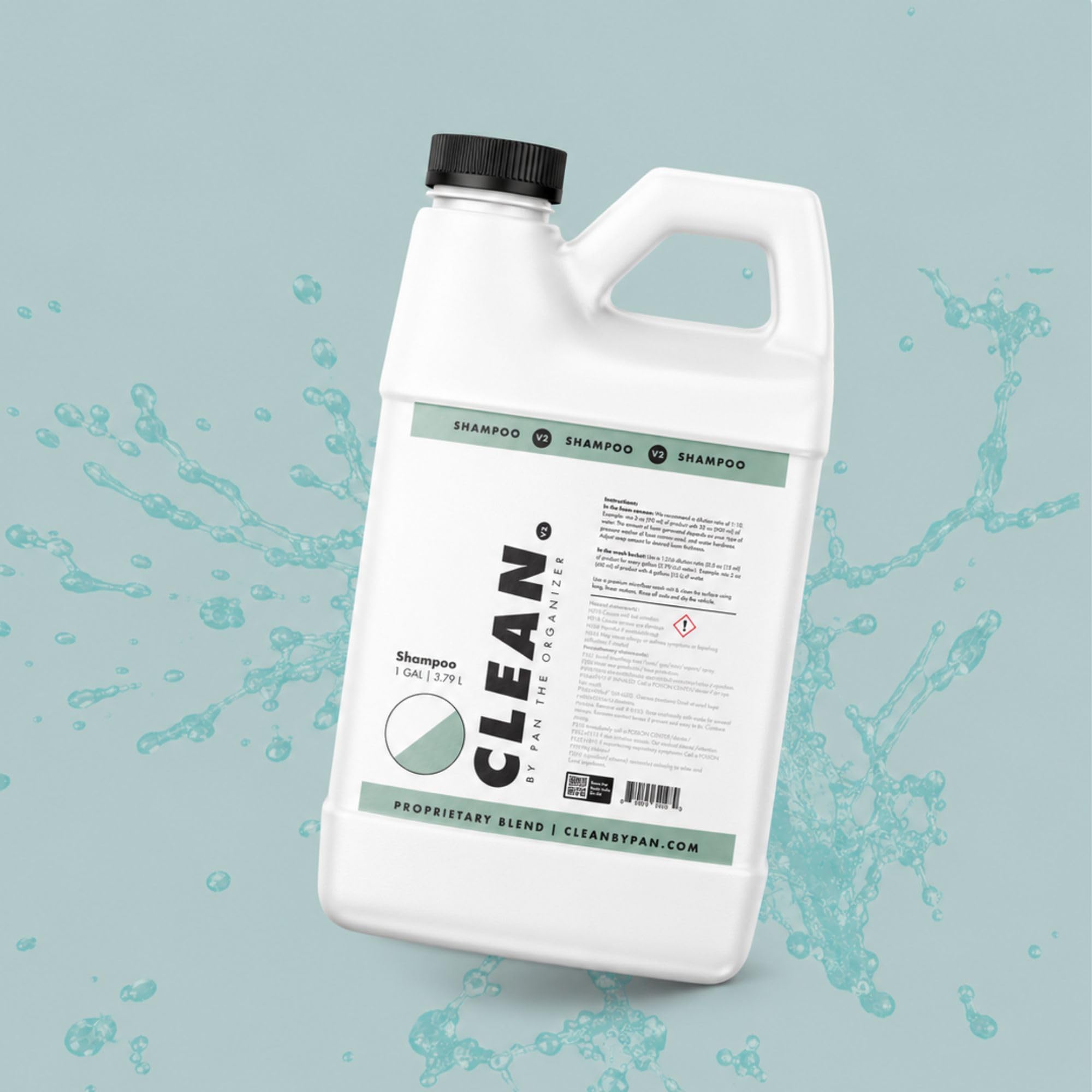 CLEAN. 128oz bottle next to hands showing scale and bulk supply benefit