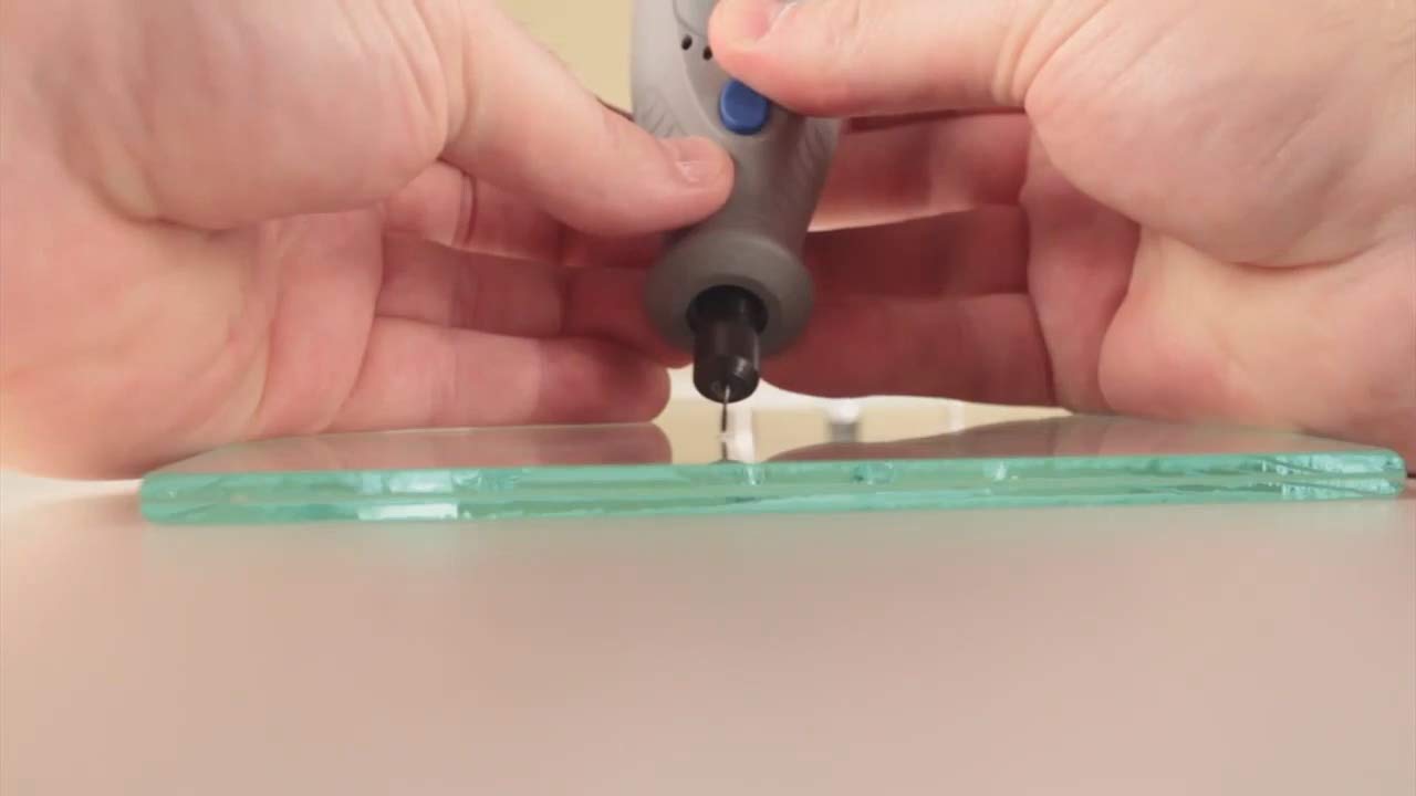 Clearshield bit making a controlled groove for resin application