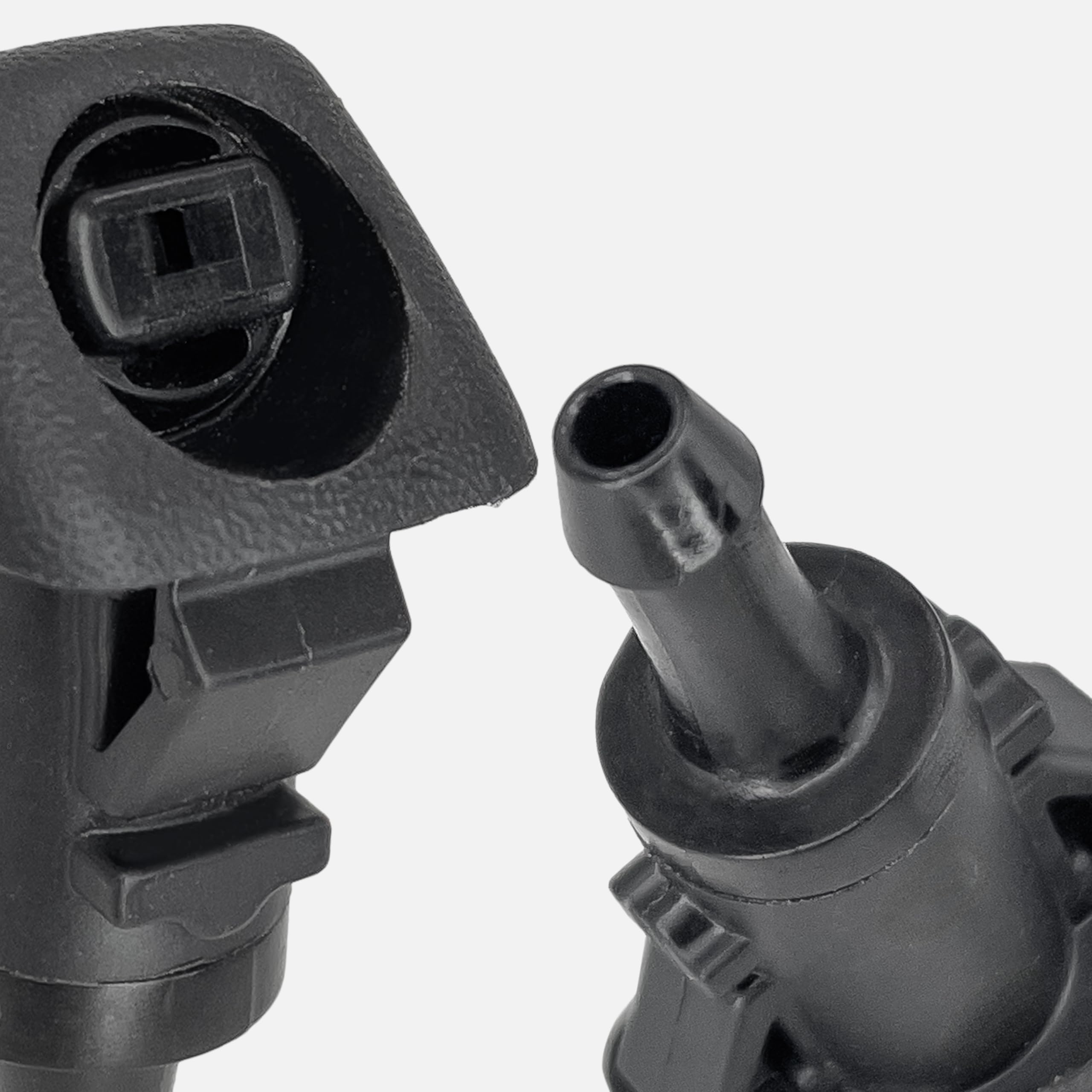 Click&Fit nozzle next to ruler showing compact size benefit