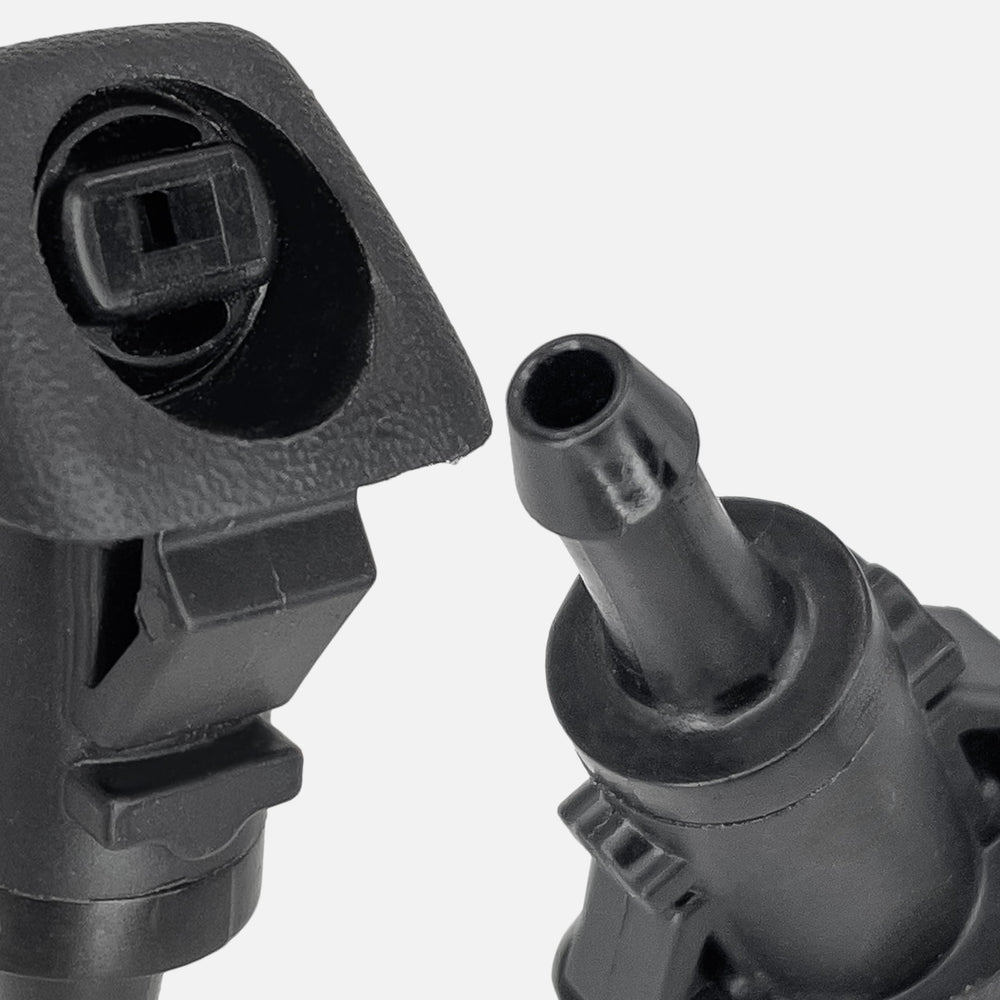 Click&Fit nozzle next to ruler showing compact size benefit