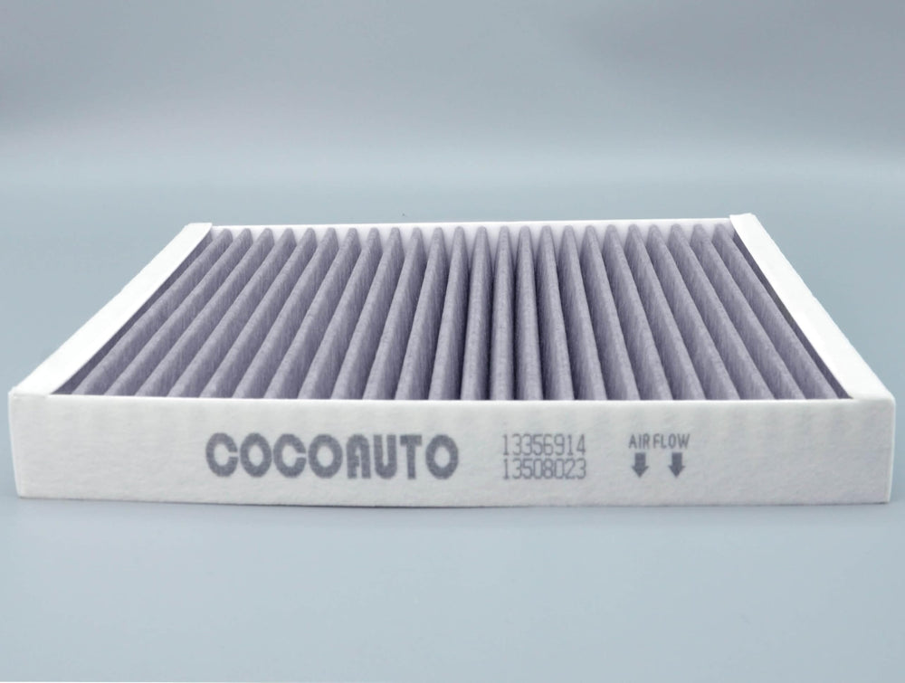 COCOAUTO cabin filter being inserted into HVAC slot reducing dust and odors for passengers