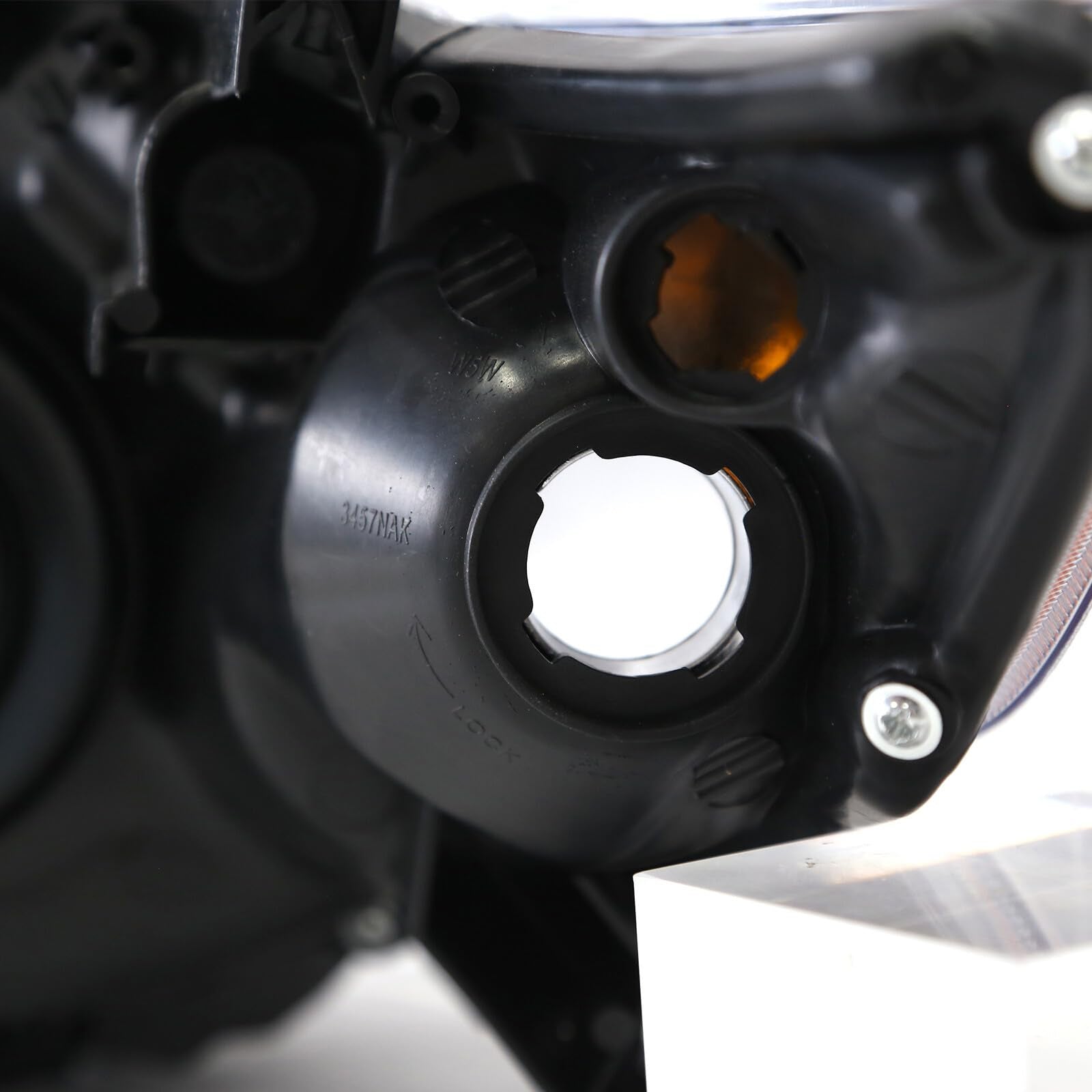 corkiauto headlight held in hand to show scale and easy handling for DIY install