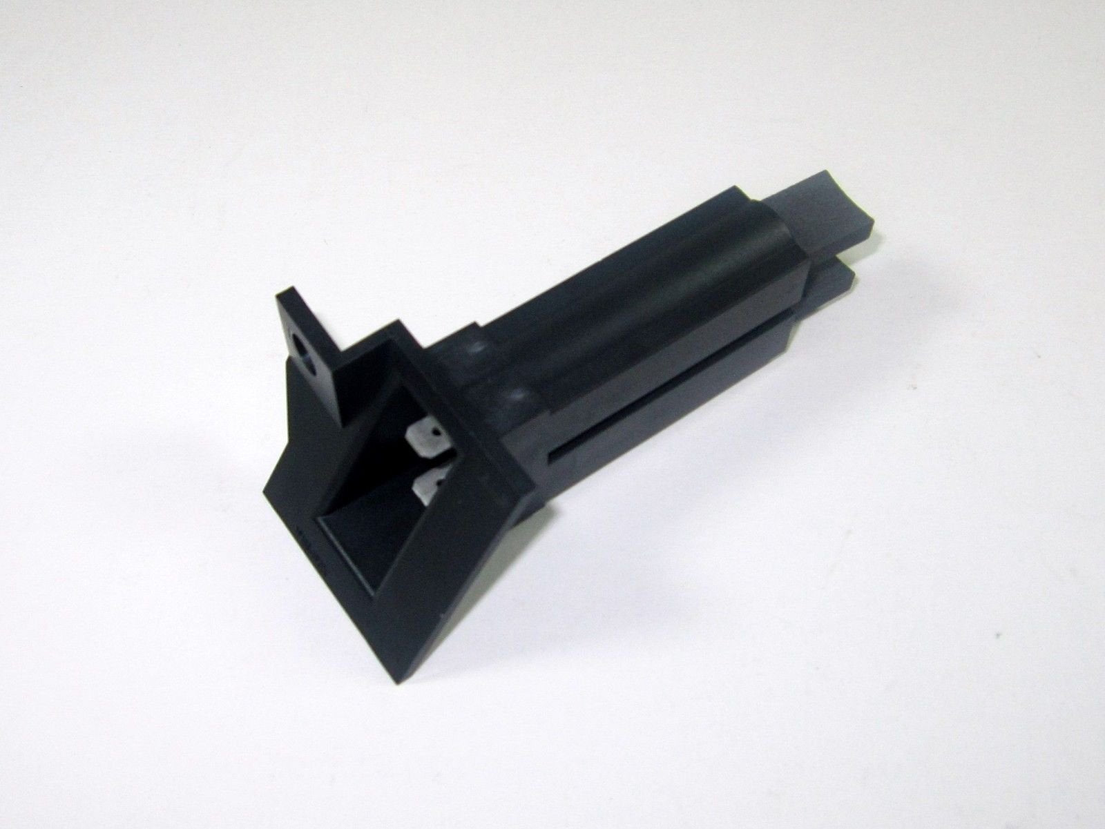 Cummins Onan brush block assembly front view showing precise fit and reliable contact