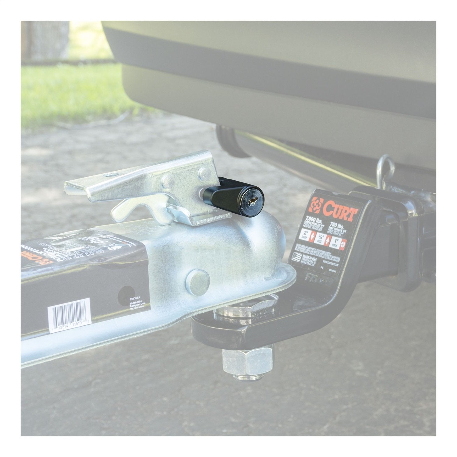 CURT lock on a hitched trailer in lifestyle scene showing theft deterrence