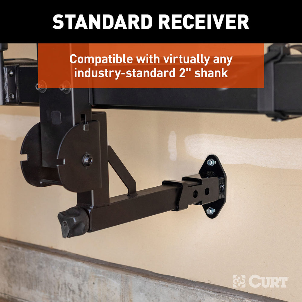 CURT beside a 2x4 stud showing scale and easy stud-mount installation benefit