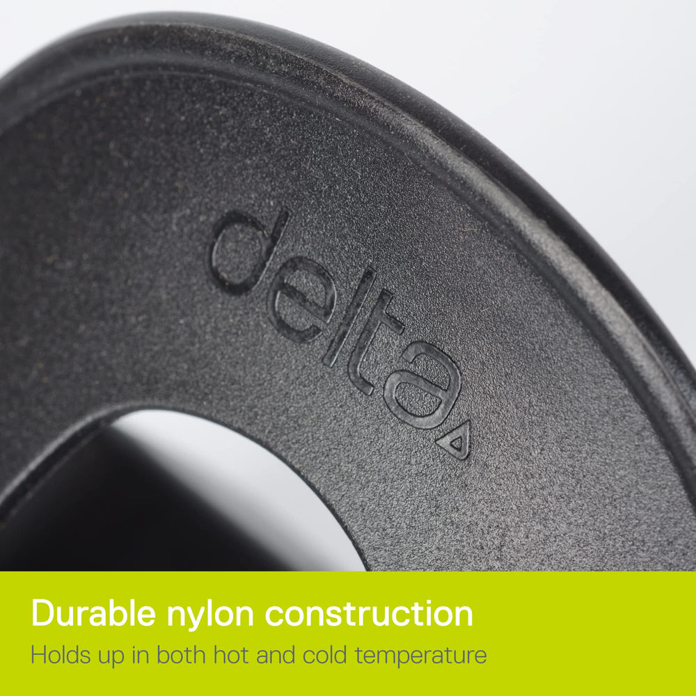 Delta toe clips beside shoe to show scale and compatibility with common footwear