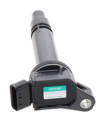 Denso 673-1309 seated in spark plug bore demonstrating precise fit