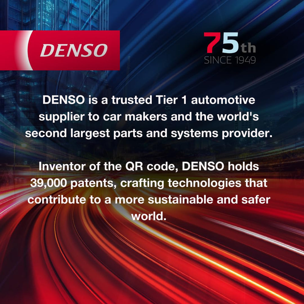 Denso IKH16TT plugs on a workbench in a garage lifestyle scene showing maintenance ease