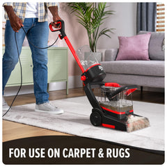 Dirt Devil solution pouring into carpet cleaner tank for effective use