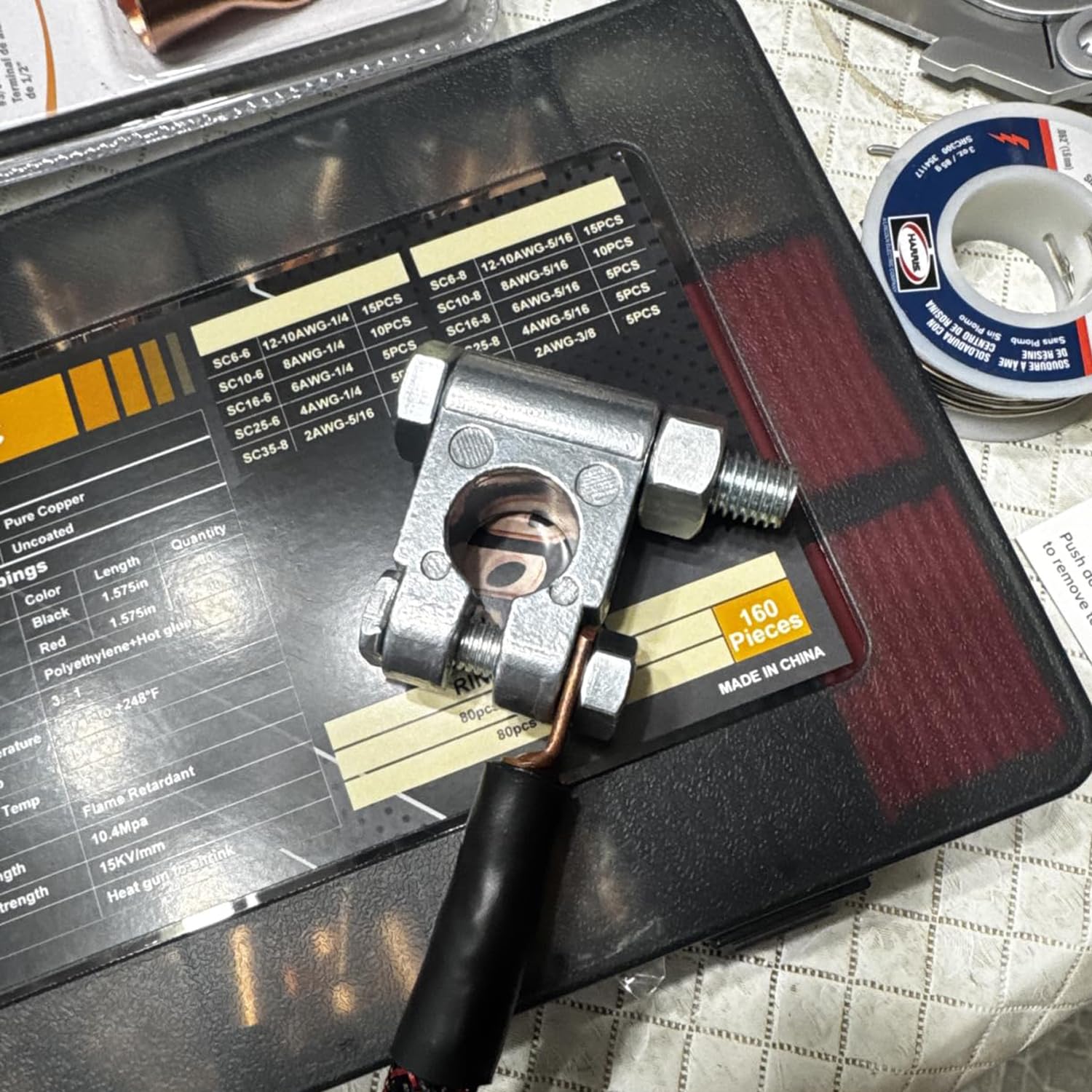 DLronwey terminal installed on car battery post demonstrating secure fit under vibration