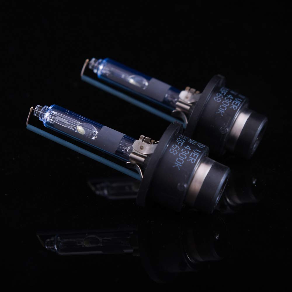 DMEX headlights illuminating a nighttime road showing improved distance and clearer contrast