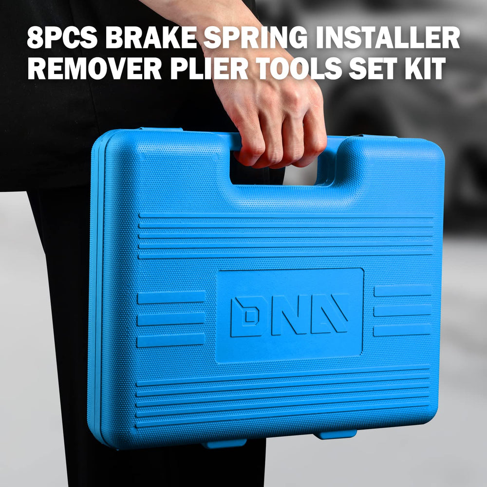 DNA MOTORING kit beside a ruler showing scale and compactness for easy garage storage