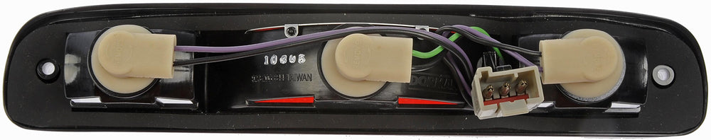Dorman 923-206 installed on pickup rear window demonstrating OEM fit and restored brake signaling