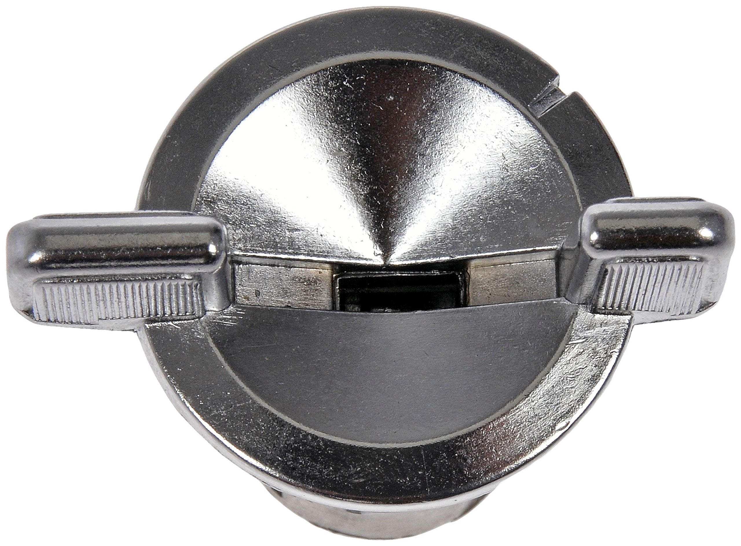 Dorman ignition cylinder next to hand and ruler, clear scale for correct fit