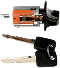 Dorman ignition lock cylinder next to key for scale and clear compatibility