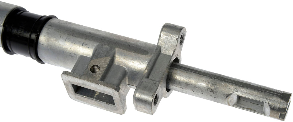 Dorman shift tube with included hardware next to ruler for size and fit reference