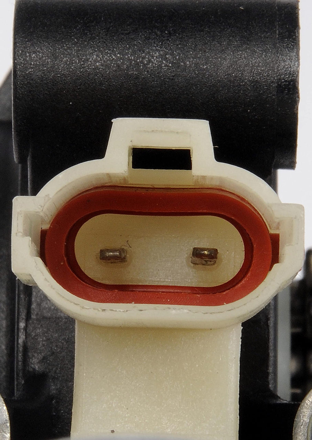 Dorman motor beside ruler for scale, helps verify size and compatibility
