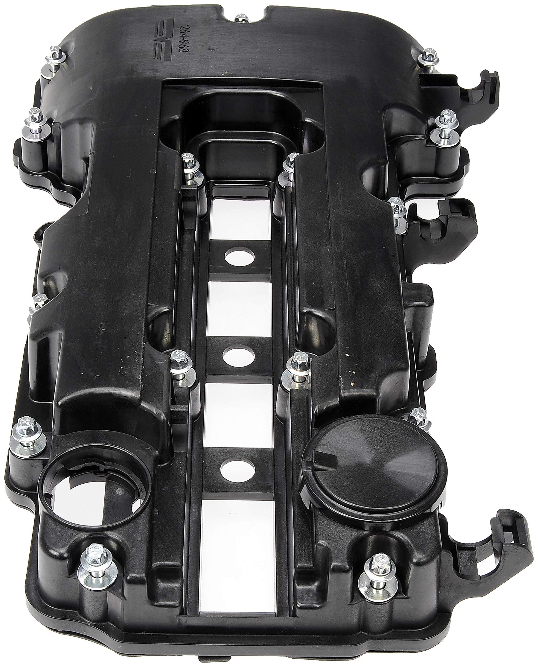 Dorman valve cover next to ruler to show scale and accurate fitment