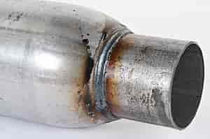 Dynomax Race Bullet installed on a race car showing tone-focused performance benefit