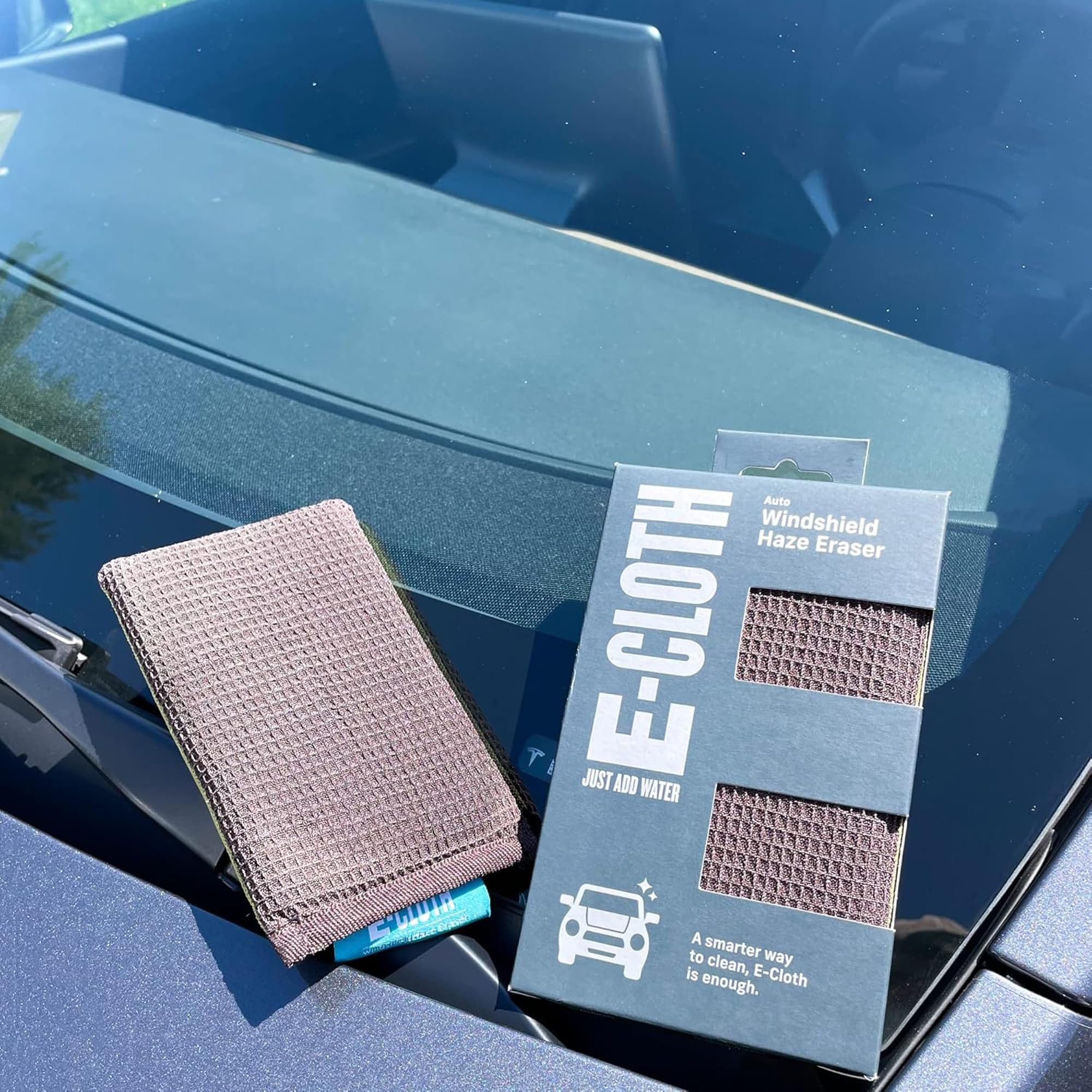 E-Cloth smooth microfiber side close-up polishing glass to streak-free clarity