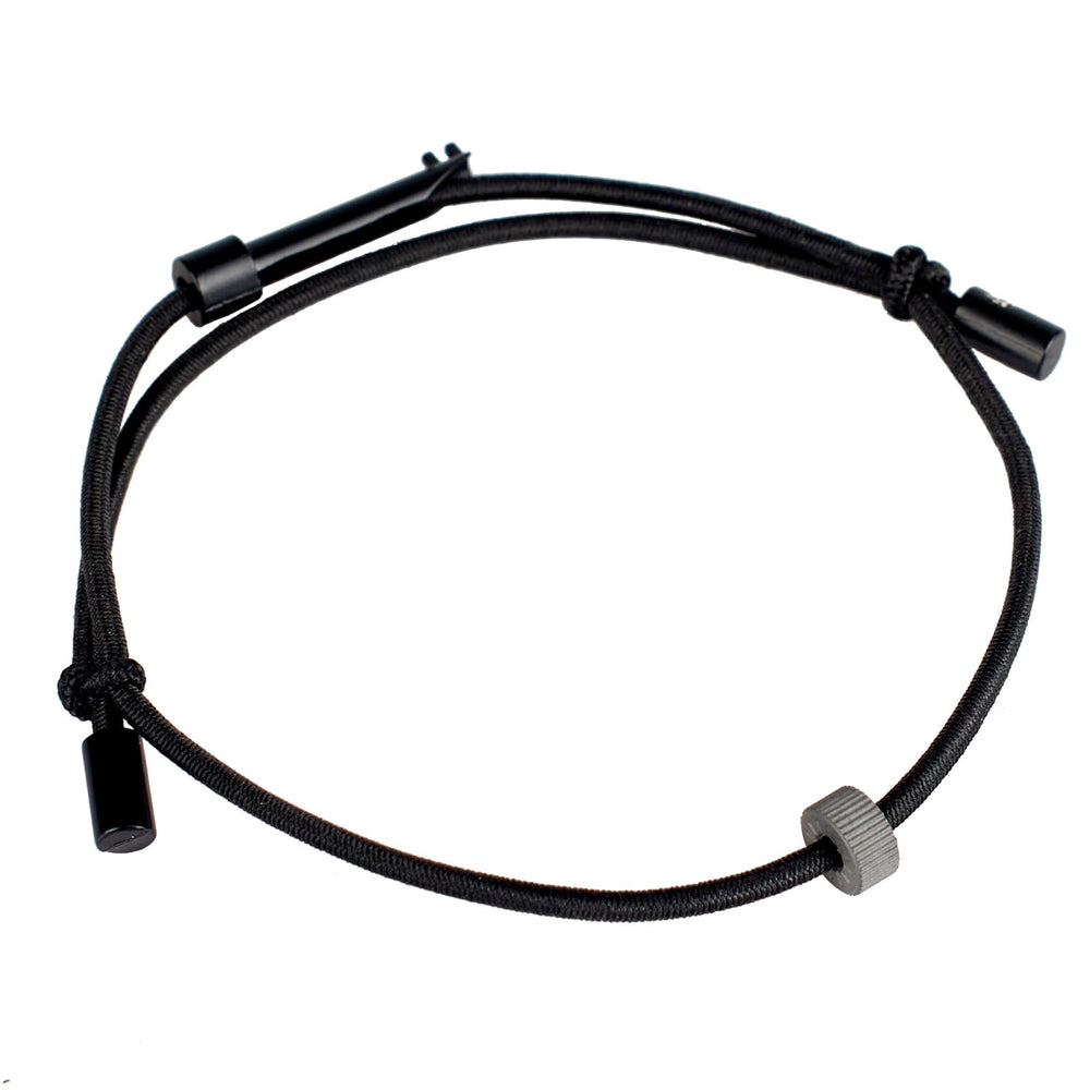 ECBANLI bracelet front view showing band and striker bead for quick access