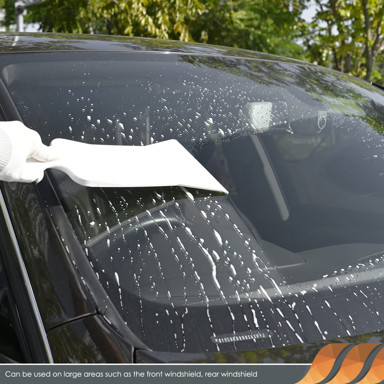 EHDIS lifestyle car detailing scene showing faster tint and glass prep