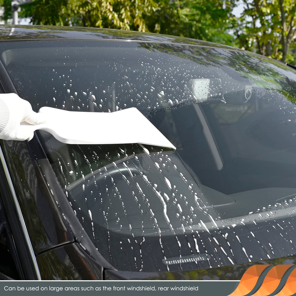 EHDIS lifestyle car detailing scene showing faster tint and glass prep