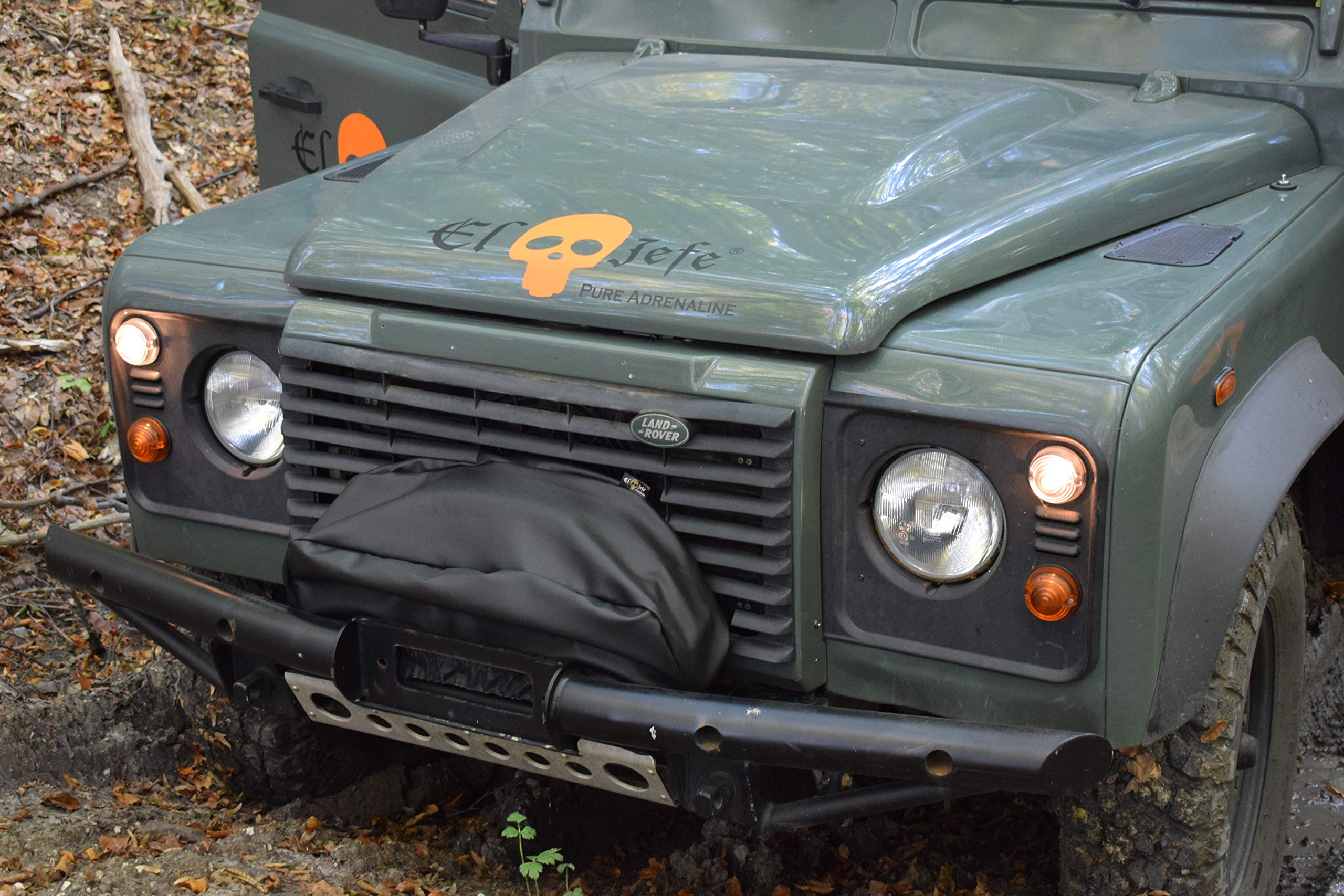 EL JEFE cover on an ATV at a dock showing marine and trail protection
