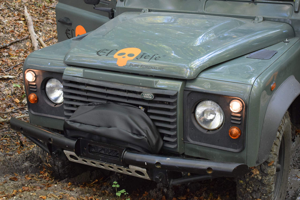 EL JEFE cover on an ATV at a dock showing marine and trail protection