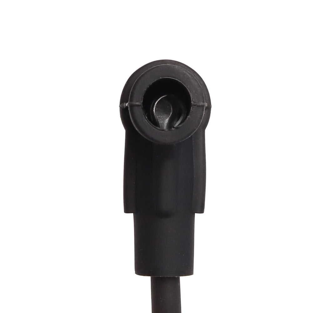 ENA ignition coil size comparison with coin showing compact scale