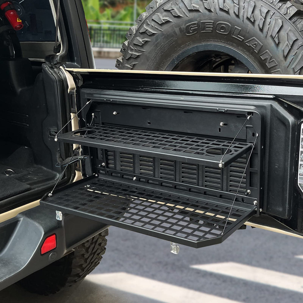 EOIS tailgate table lower shelf holding tools and gear for organized storage