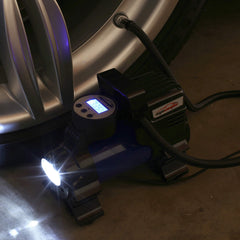 EPAuto inflator in use on car tire demonstrating fast inflation and auto shutoff